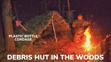 Solo Overnight Building a Debris Hut In the Woods Using a Plastic Bottle with  BACON and Steak